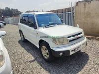 2000 Mitsubishi Pajero IO 2L Petrol SUV, main photo