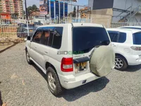 2000 Mitsubishi Pajero IO 2L Petrol SUV, photo 2