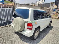 2000 Mitsubishi Pajero IO 2L Petrol SUV, photo 3